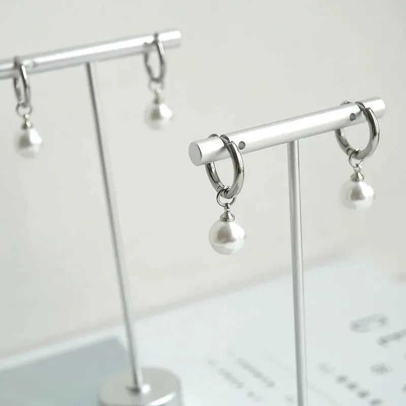 Women's alloy geometric pearl earrings with titanium steel posts