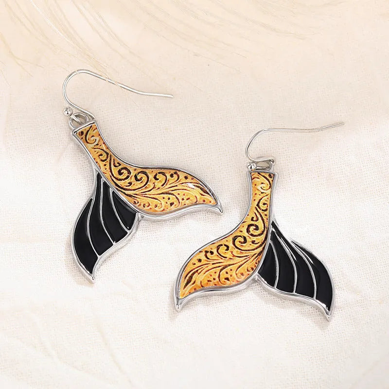 Women's fishtail earrings with whale motifs in white gold colour alloy jewellery