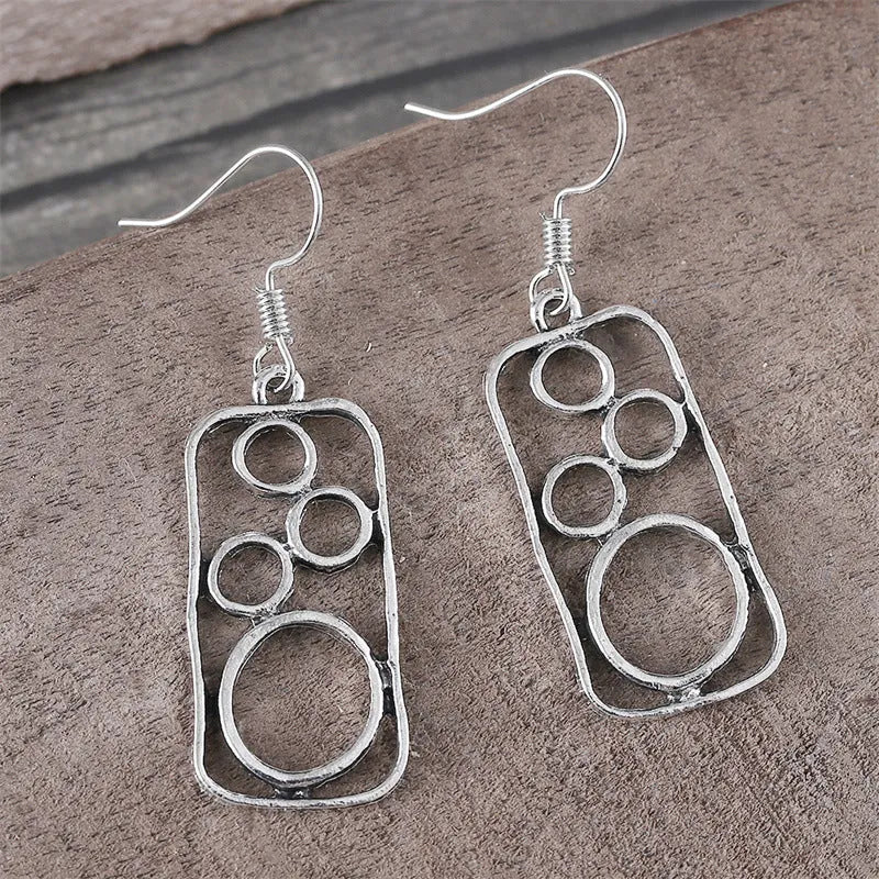 Geometric round ring earrings with irregular square details in antique silver zinc alloy