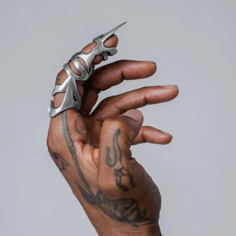 Silver punk armour finger cover ring with alloy construction and standard sizing
