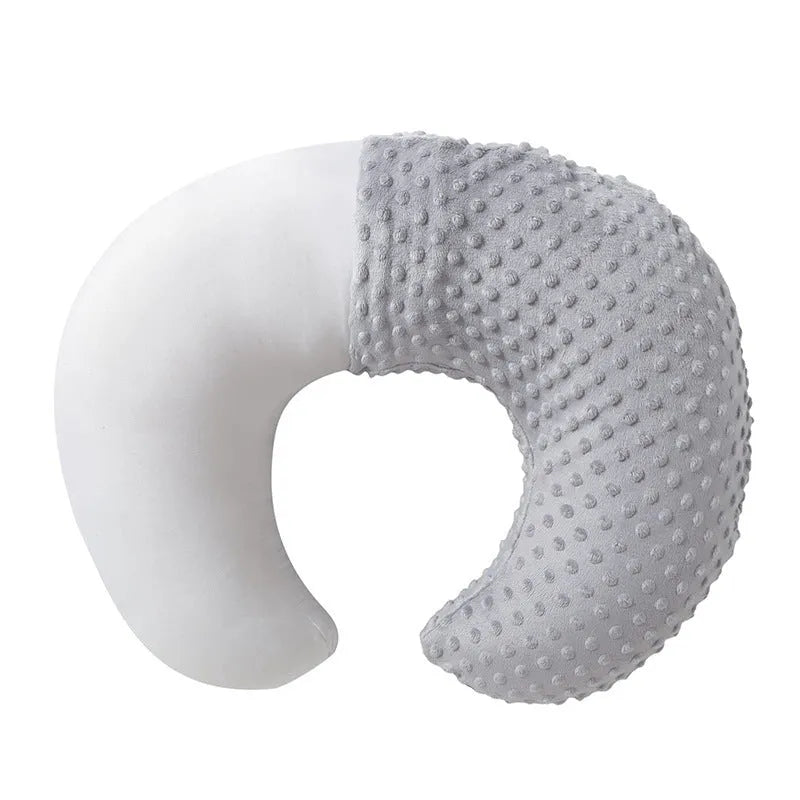 Multifunctional nursing pillow with milk spill prevention features in grey, light blue, pink and yellow colours