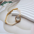Women's light gold freshwater pearl bracelet watch with round 18mm dial