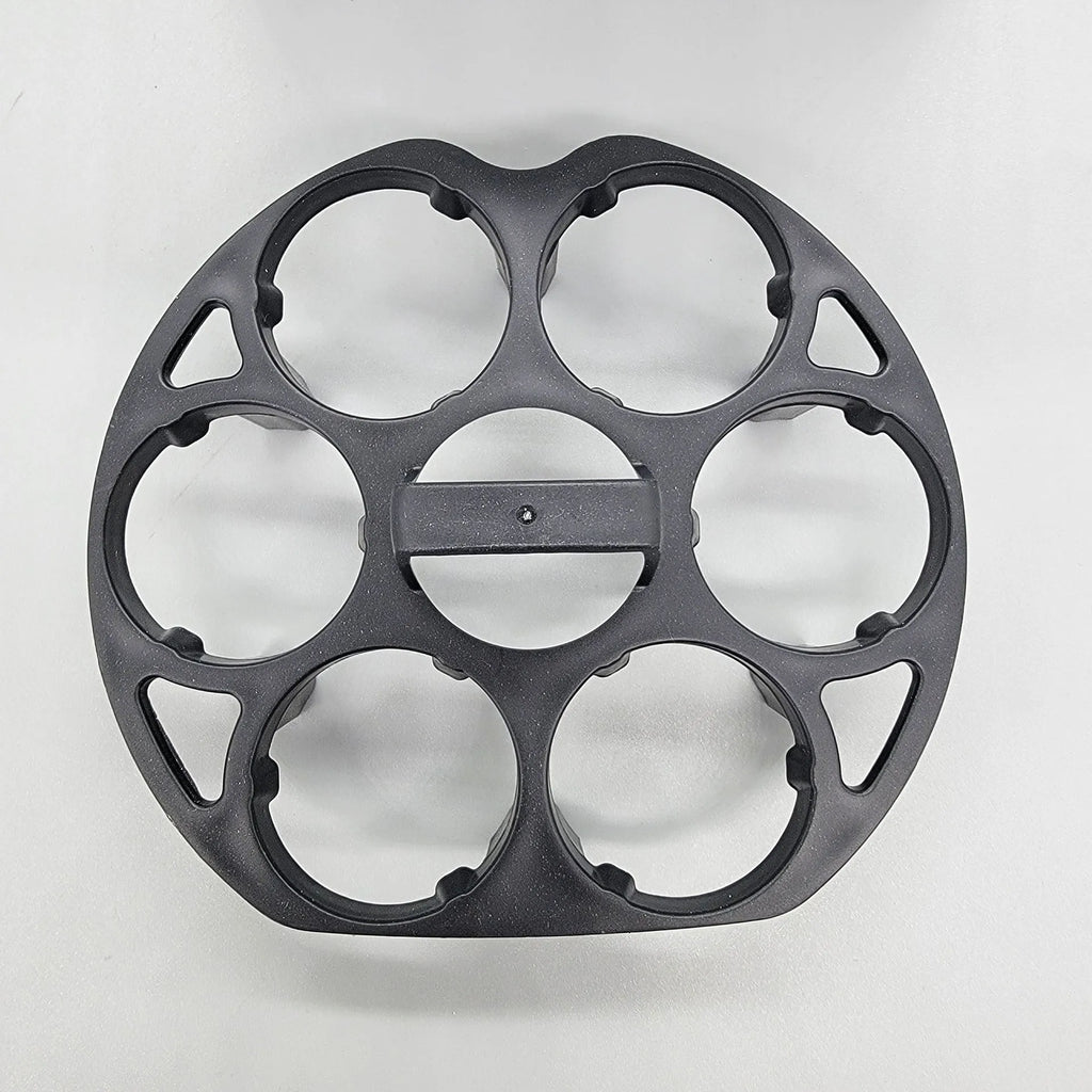 Black plastic egg holder for cooking machines measuring 13.8 by 12.6 by 5.7 cm