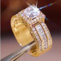 Silver-toned geometric women's ring with round elements in gold or white electroplated finish