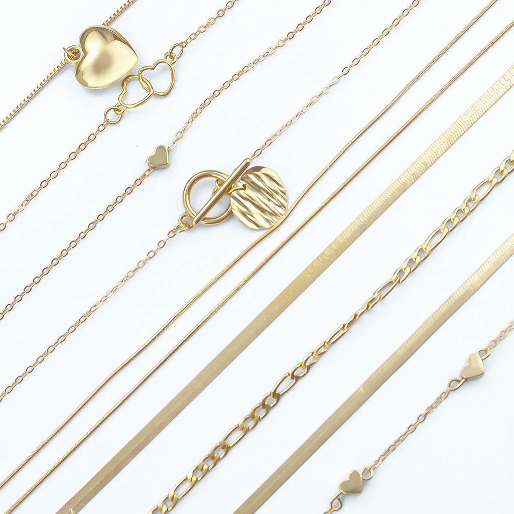 10-piece gold women's necklace set with alloy pendants on adjustable snake bones chain jewellery collection