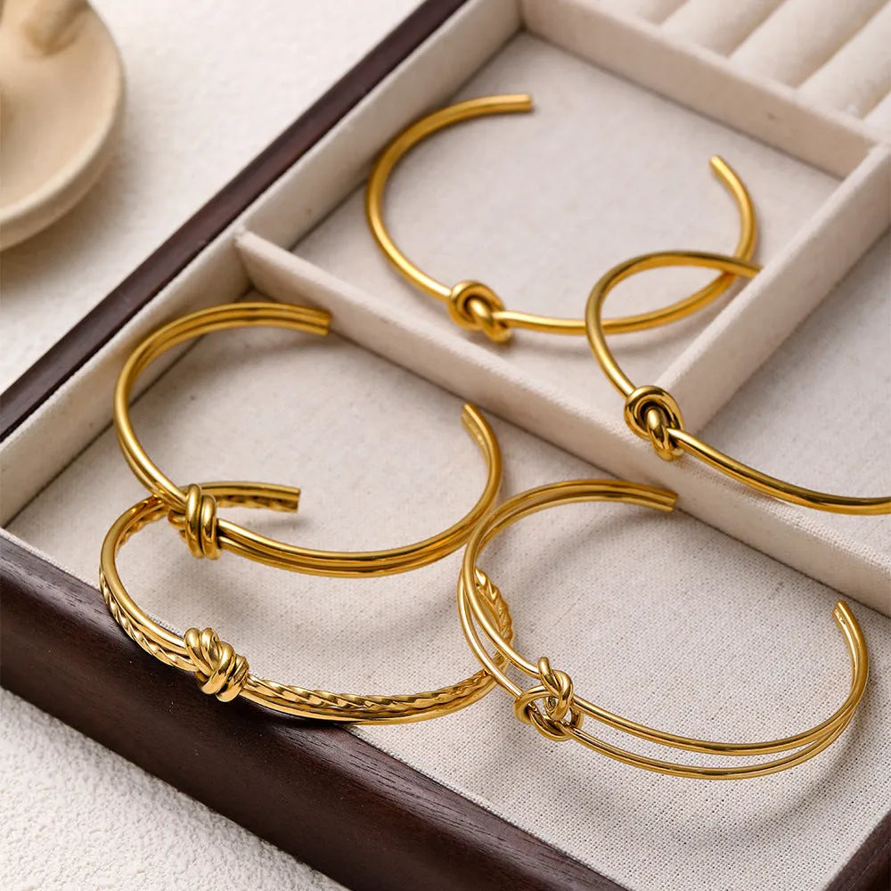 Women's adjustable C-shaped open bracelet with double-layer knotted design in gold or silver finish