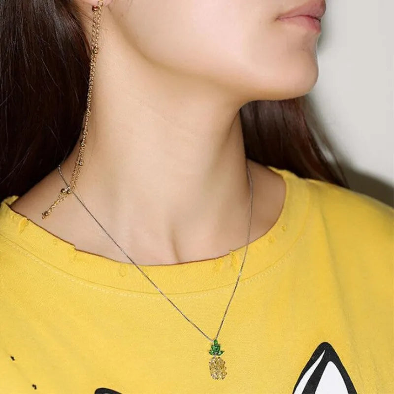 Silver plated geometric pineapple diamond necklace for women with copper white gold plating.