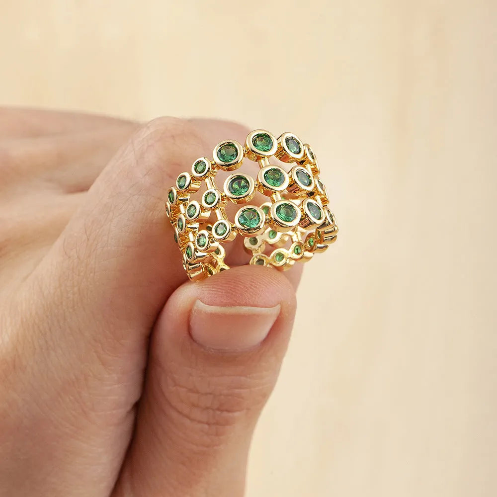 Copper wide band ring with 18K gold plating and full green zircon stones