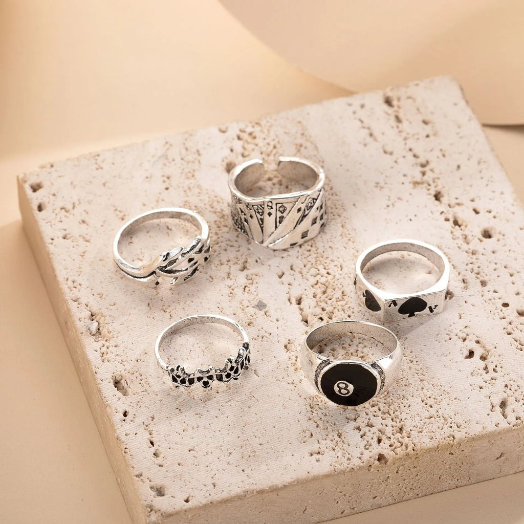 Black alloy poker ring with retro spade card design for female wearers