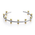 Stainless steel bracelet with textured C-shaped bead links and raised rivet details.