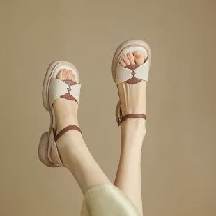 Women's khaki platform sandals with chunky heels and open toe design showing renewable leather uppers