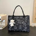 Printed canvas tote bag with rhombus pattern and sandwich pocket design in black colour
