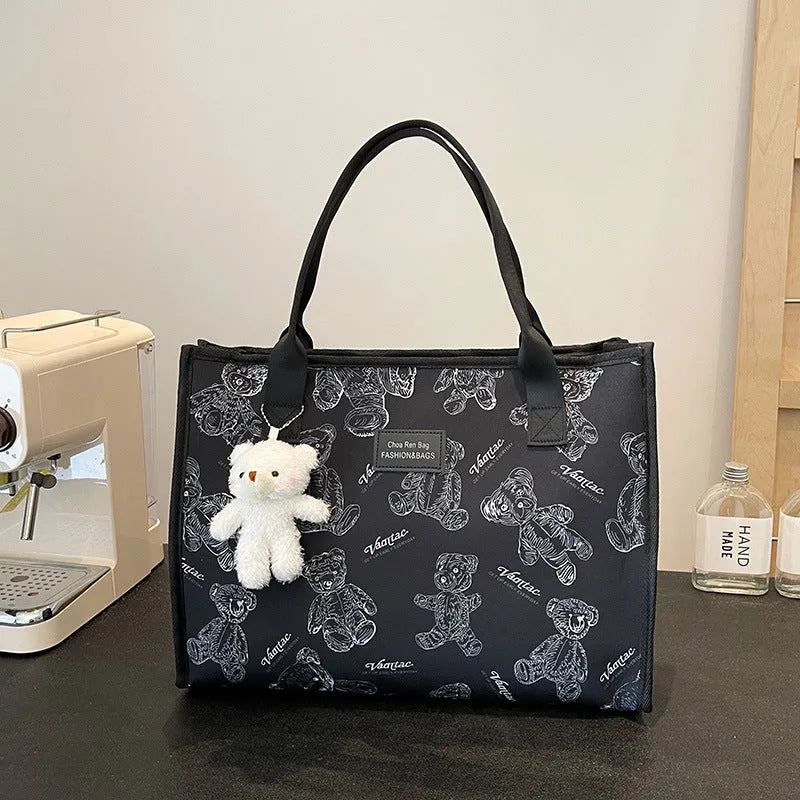 Printed canvas tote bag with rhombus pattern and sandwich pocket design in black colour
