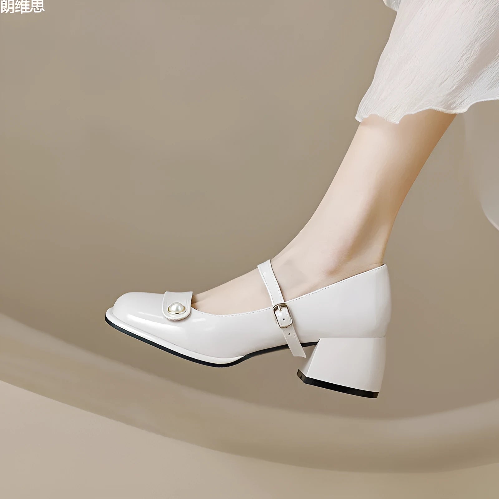 Patent leather chunky heel ankle boots with square toe and buckle fastening in apricot colour