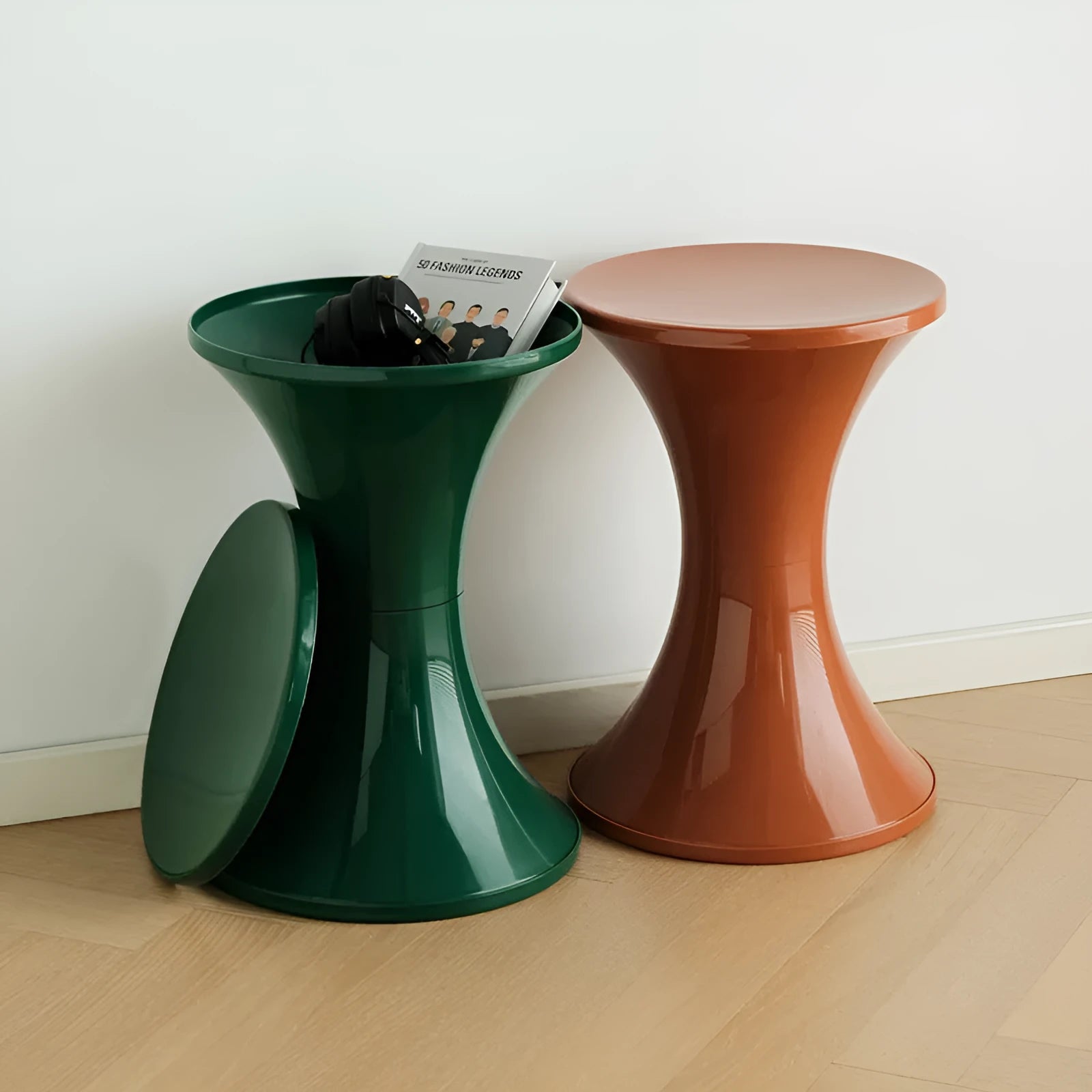 Hourglass-shaped plastic shoe changing stool in green, shown as a step aid.