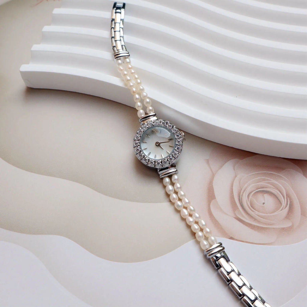 Women's light gold freshwater pearl bracelet watch with round 18mm dial