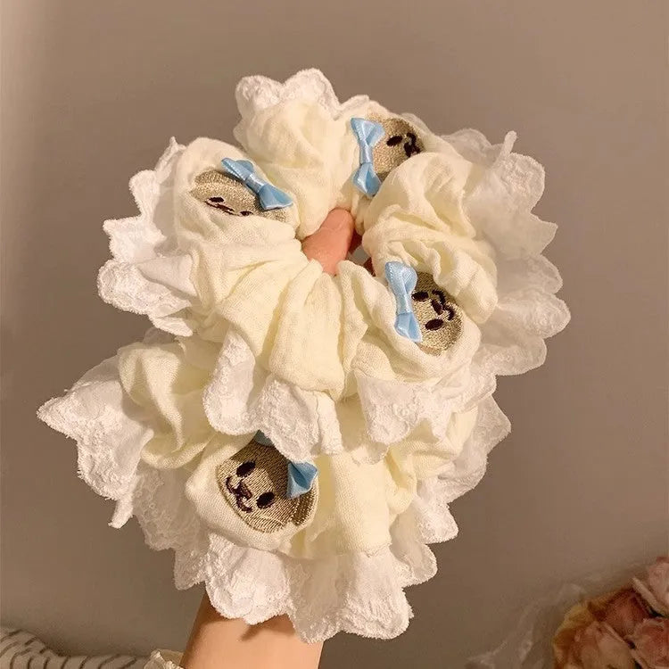 Bear blue bow lace large intestine hair ring elastic headband on white background