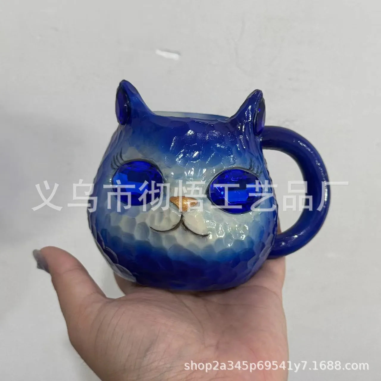 Resin crystal earth cat cup craft ornament in blue, green, pink or purple for promotional gifting.