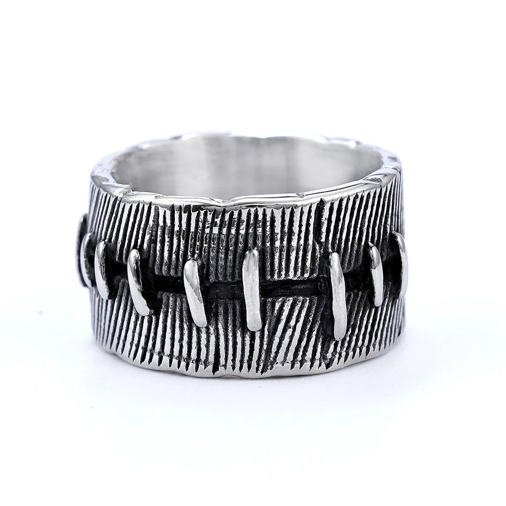 Titanium steel geometric double ring with U-shape, stitched pattern, and retro dark colour