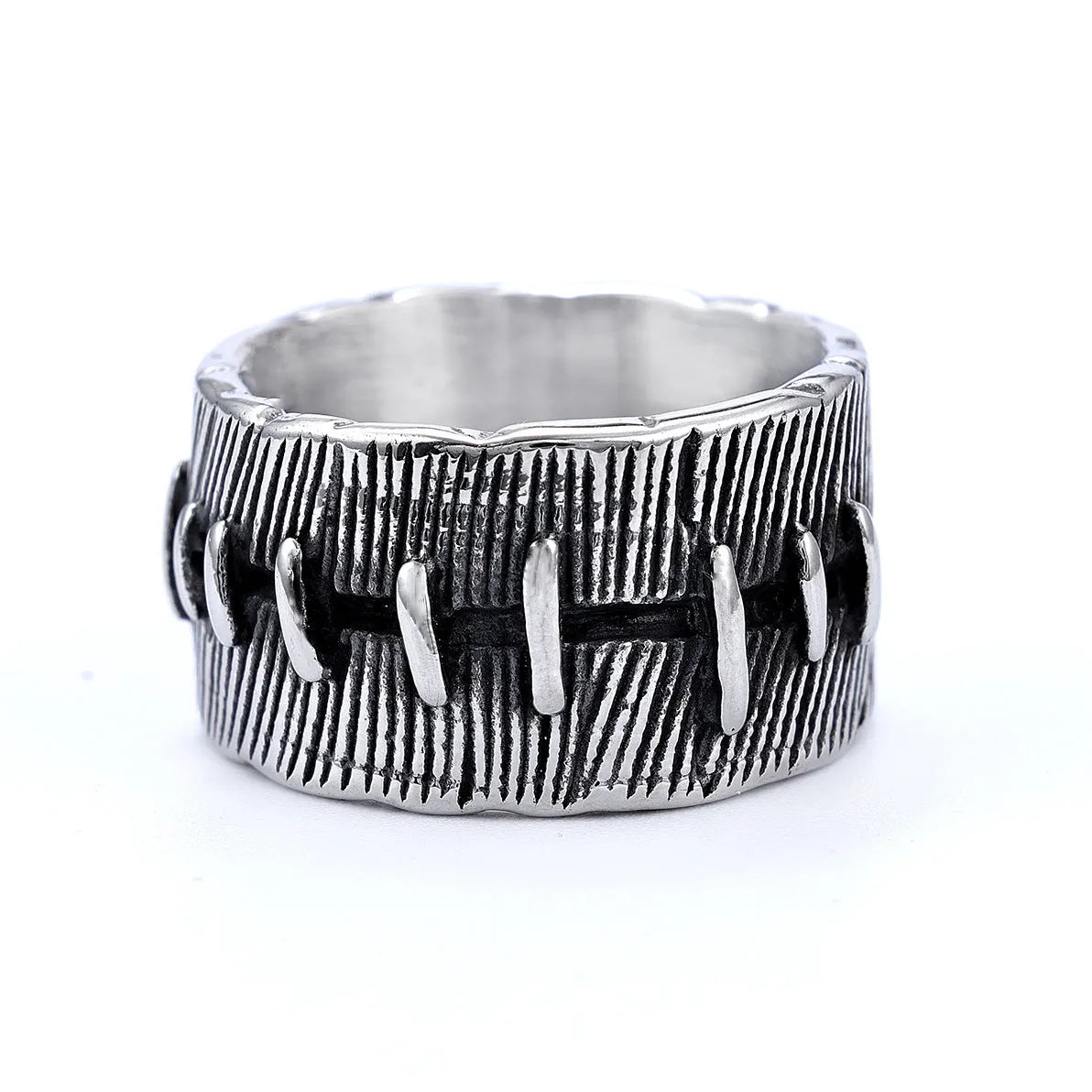 Titanium steel geometric double ring with U-shape, stitched pattern, and retro dark colour