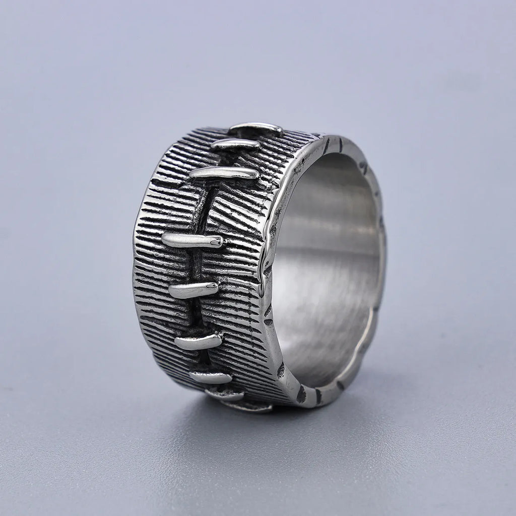 Titanium steel geometric double ring with U-shape, stitched pattern, and retro dark colour