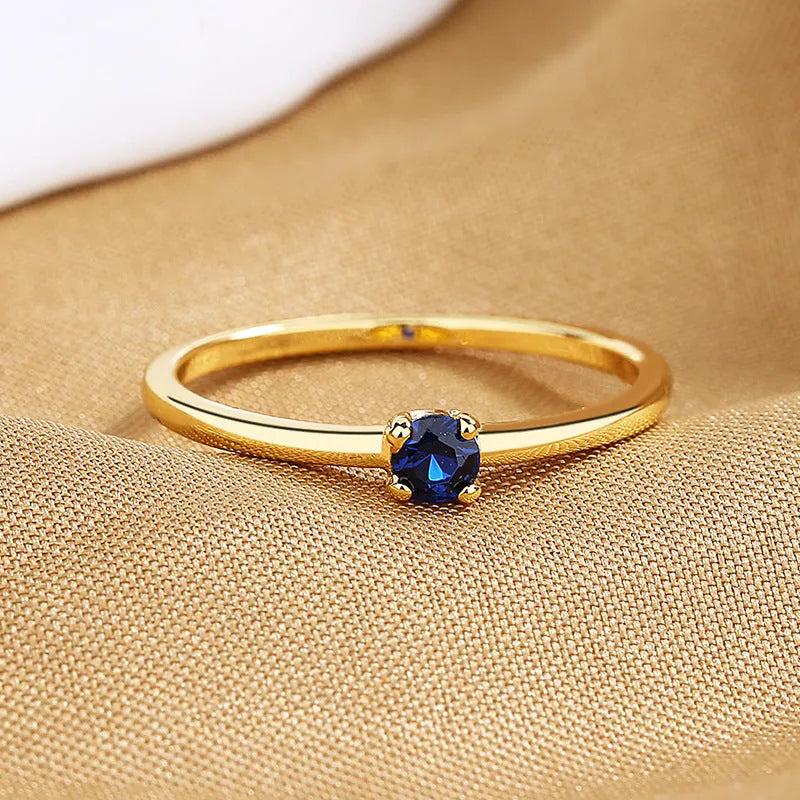 Women's copper ring with single diamond circle design in geometric shape