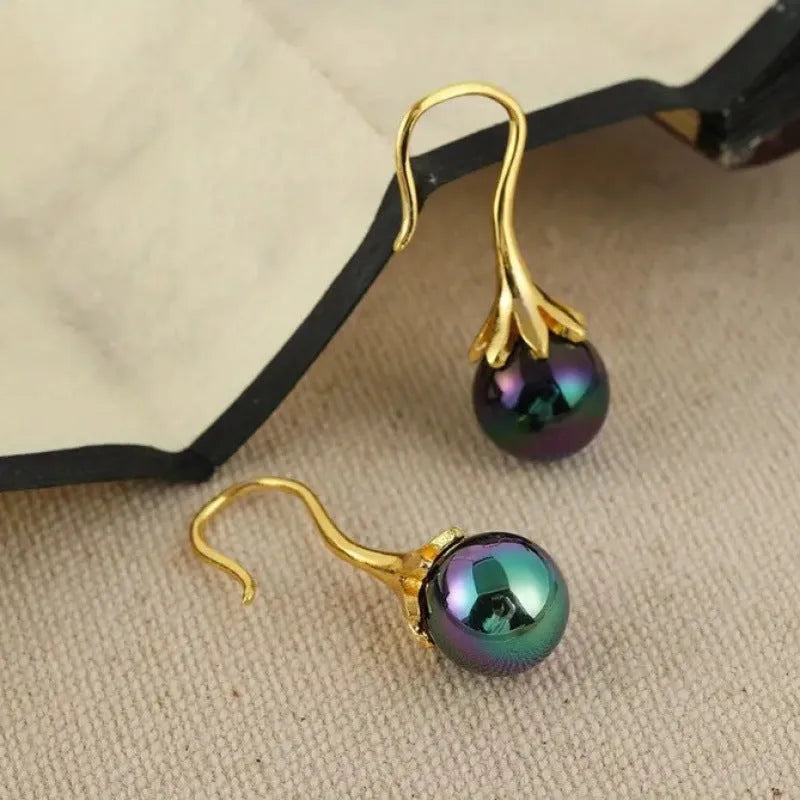 Gold electroplated retro fashion women's earrings with personalised creative design elements