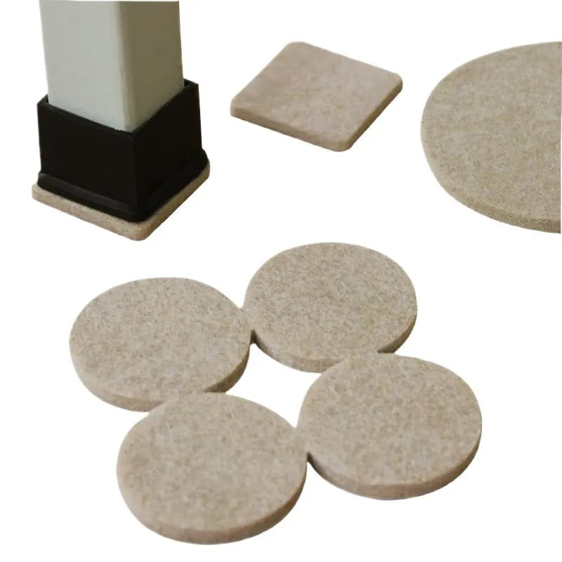 Assortment of beige plastic furniture leg protection pads in round and square sizes on wooden floor