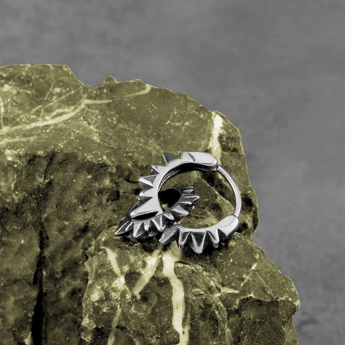 Steel colour stainless steel round ring earrings with retro design and polished finish