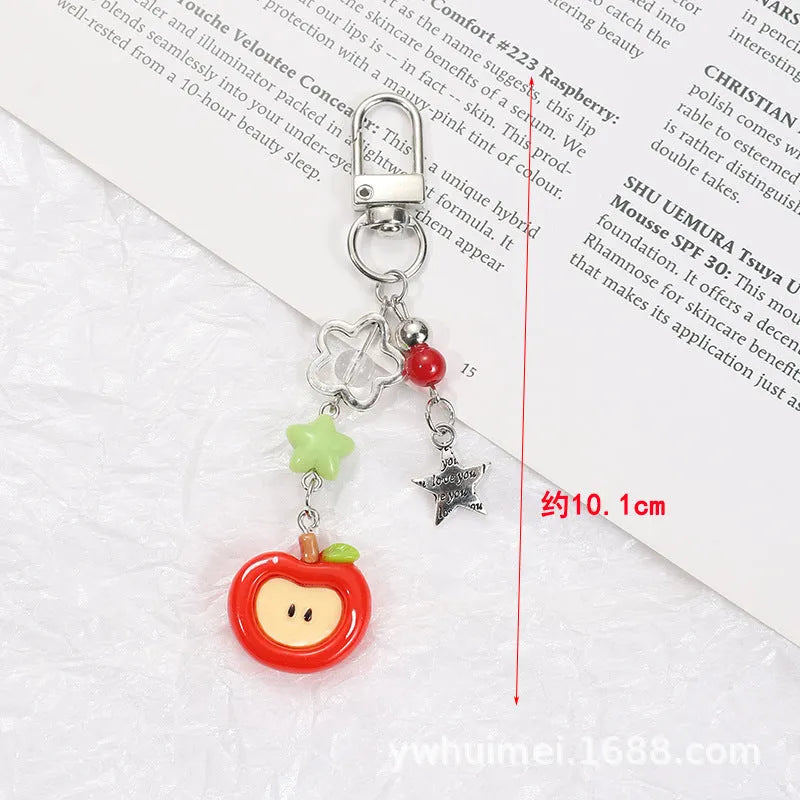 Plastic resin mobile phone keychain with fruit pattern including apple and strawberry designs