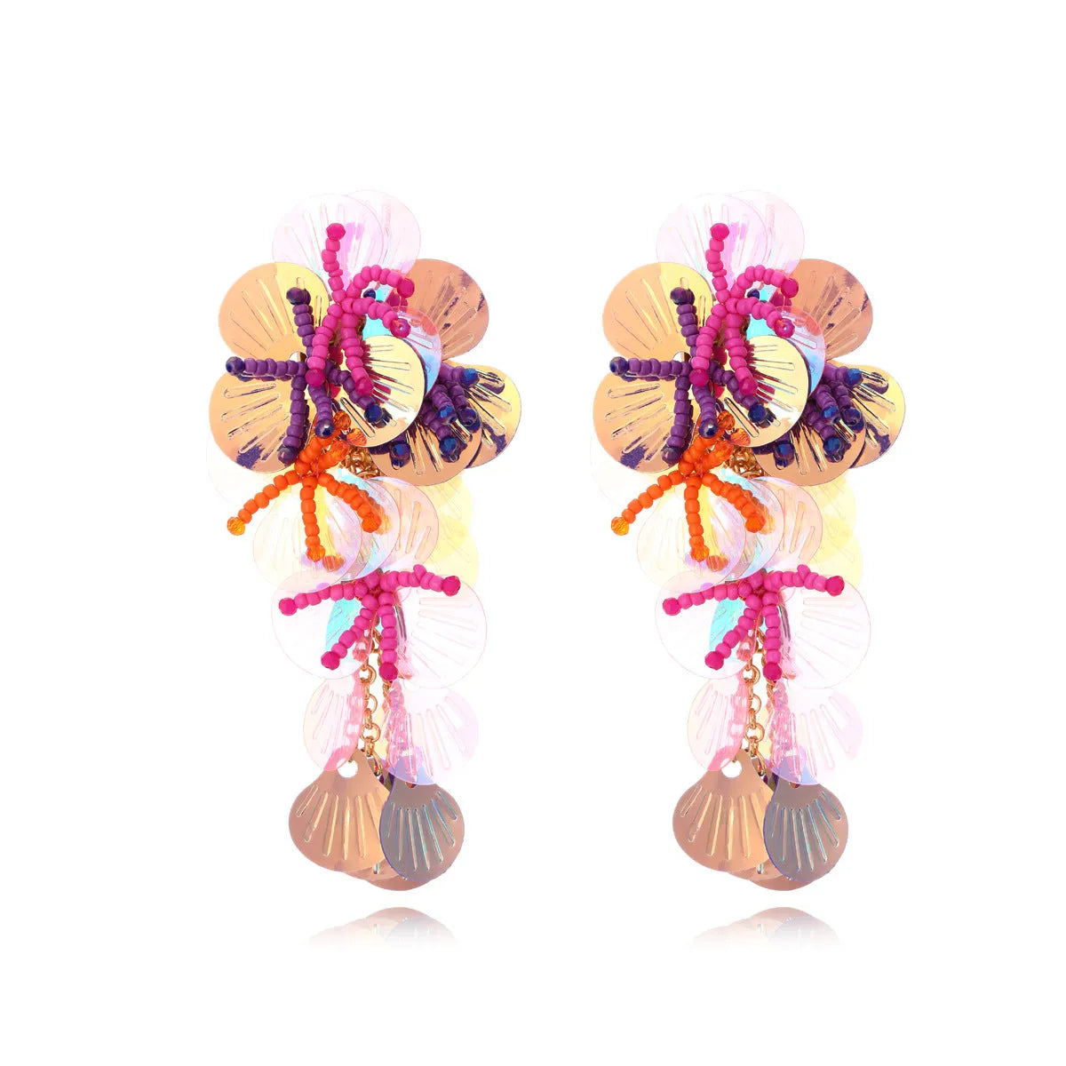Close-up of handmade colourful string bead flower and leaf earrings in exaggerated dopamine style.