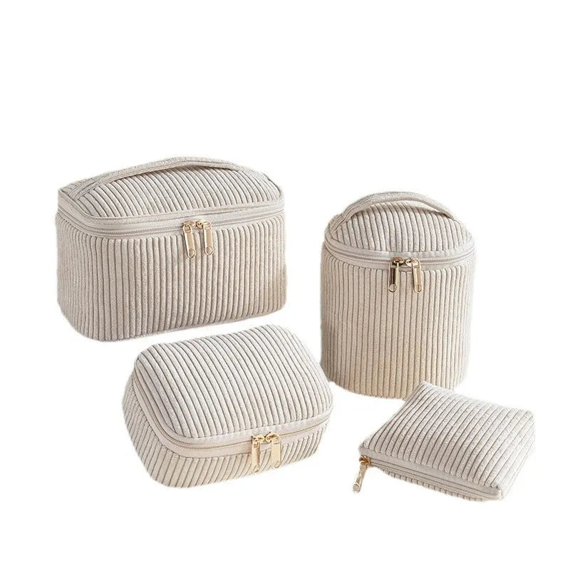 Four cube-style flannelette makeup bags in matching blue with white dots design
