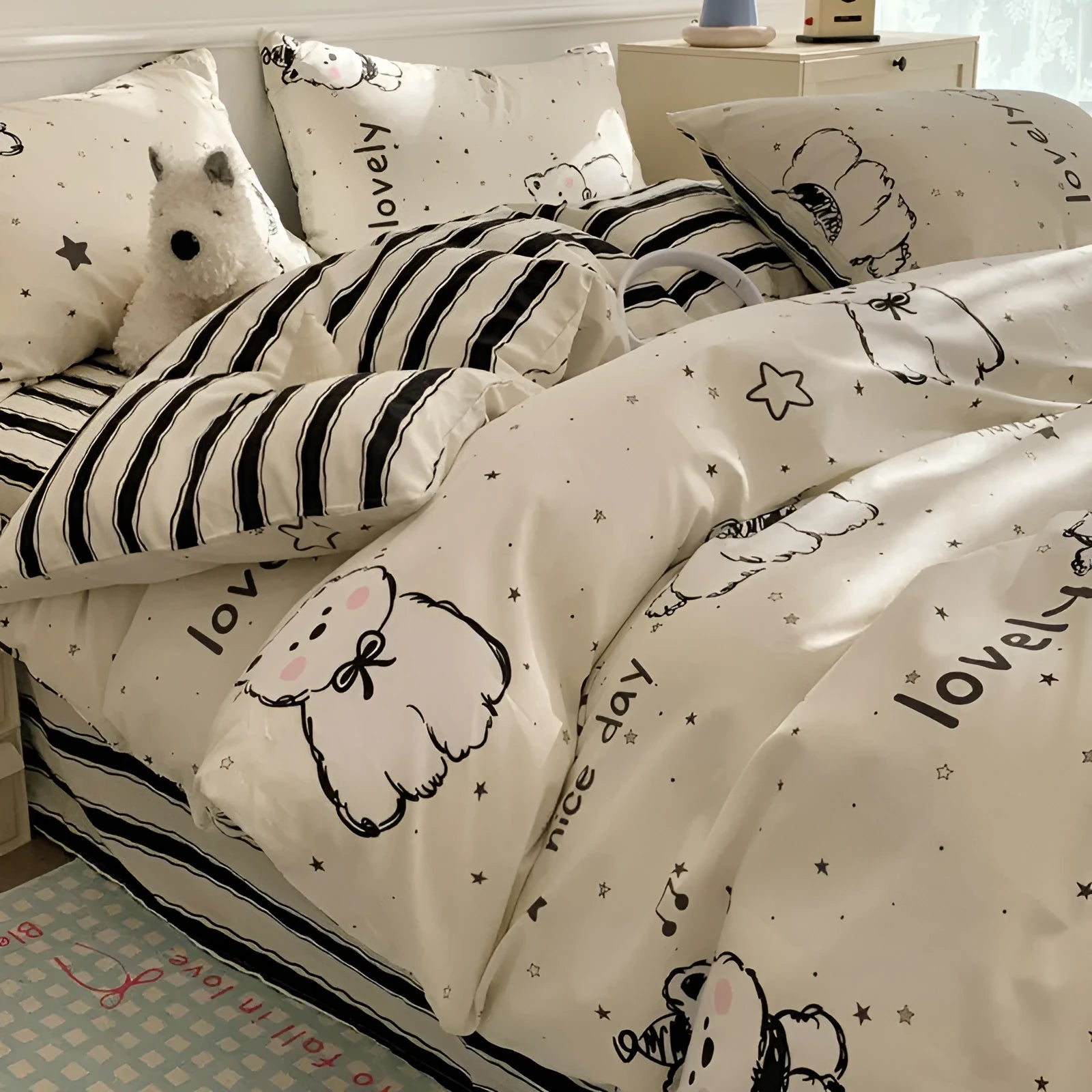 Cartoon dog pattern four-piece cotton bedding set showing multiple bed size options
