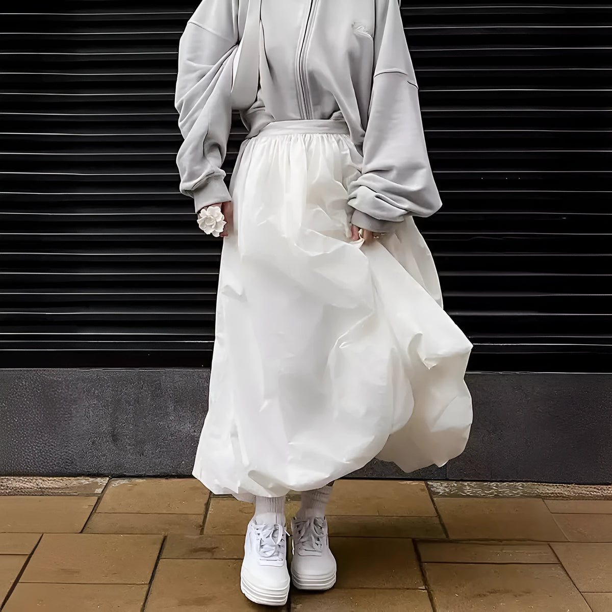 Women's solid colour long cotton skirt in black or white for casual commuting wear