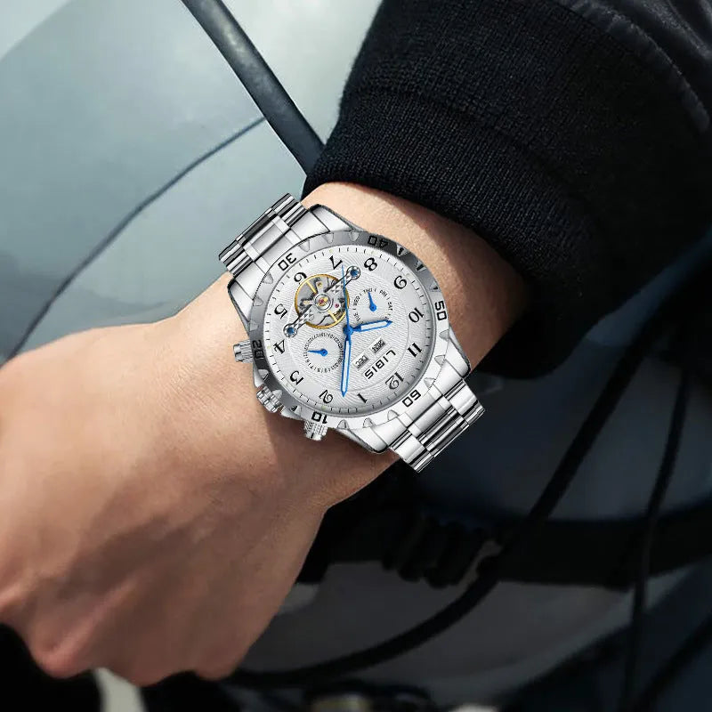 Men's silver stainless steel automatic watch with perpetual calendar function and sapphire crystal glass