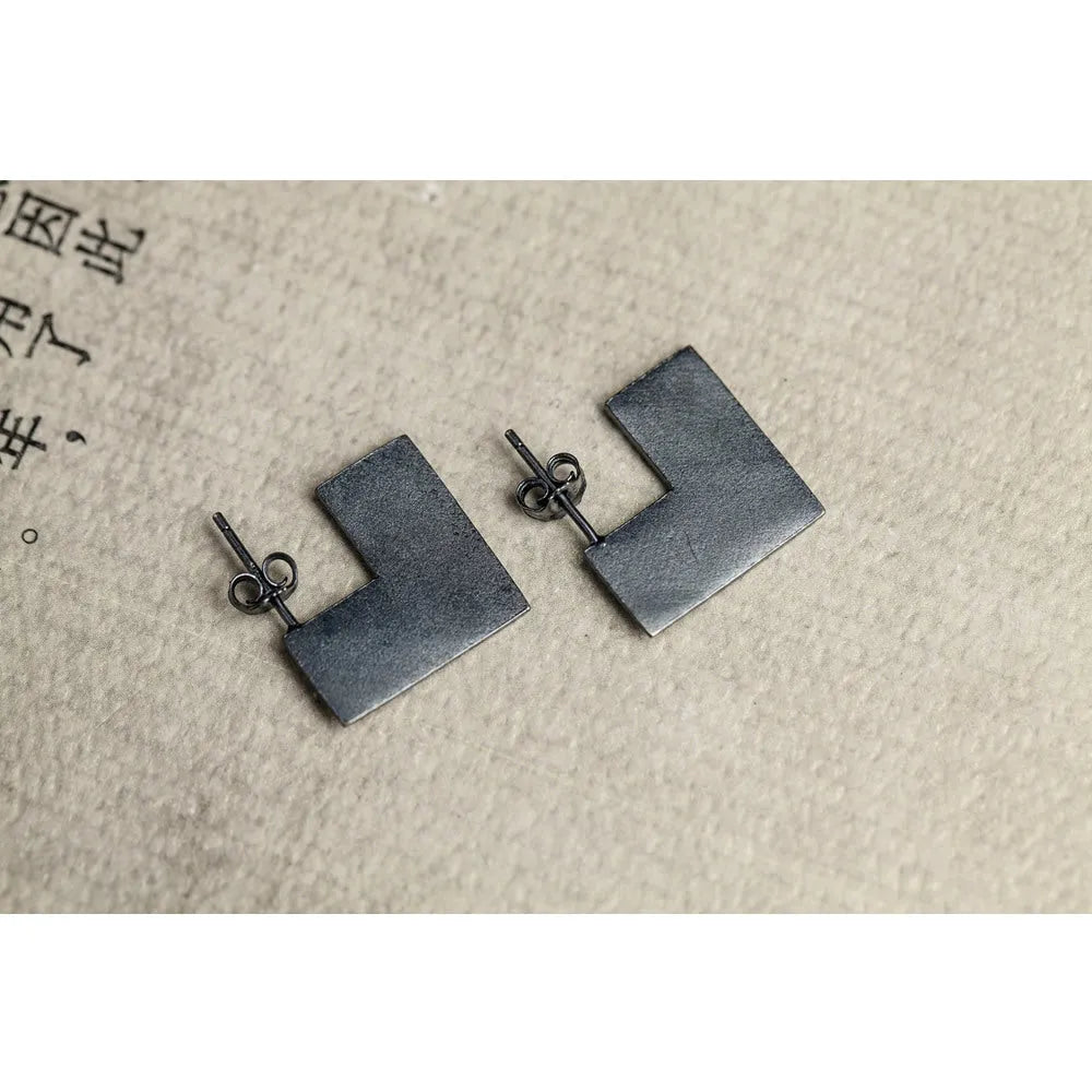 Sterling silver geometric square earrings with oxidation black finish, 16mm minimalist ring design.