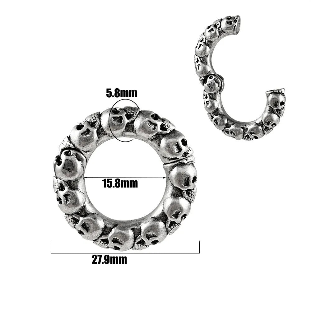A pair of silver fashion earrings with a raised totem pattern, shown in one of 15 available electroplated colour finishes.