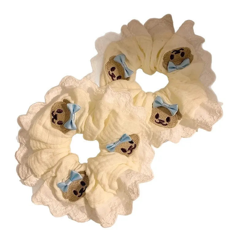 Bear blue bow lace large intestine hair ring elastic headband on white background
