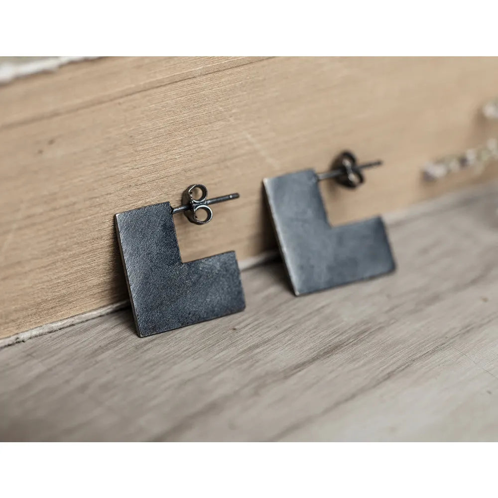 Sterling silver geometric square earrings with oxidation black finish, 16mm minimalist ring design.
