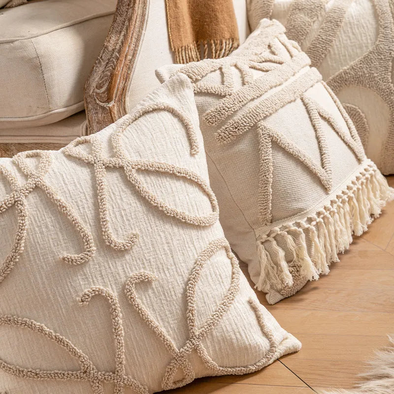 Knitted striped pillow cover with decorative tassel edging in a choice of six patterns.