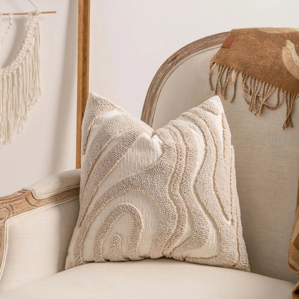Knitted striped pillow cover with decorative tassel edging in a choice of six patterns.