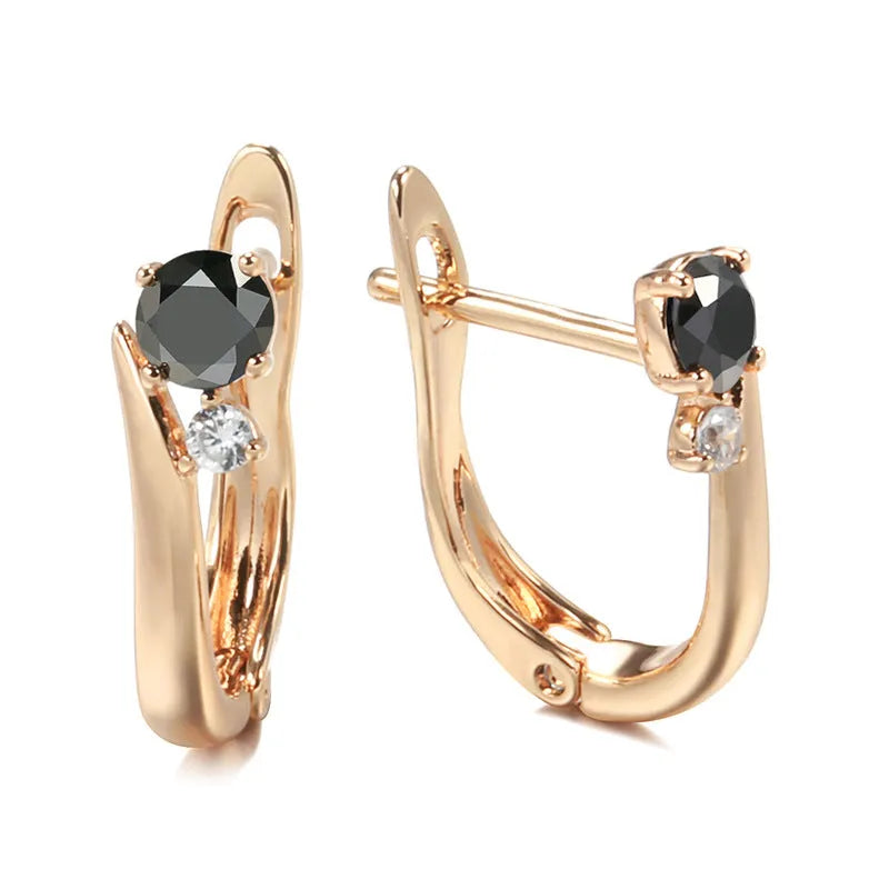 Gold geometric drop earrings with black agate stone accents and retro design