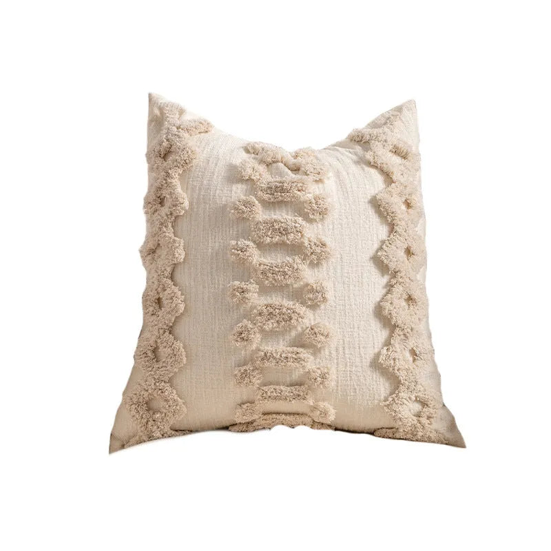 Knitted striped pillow cover with decorative tassel edging in a choice of six patterns.