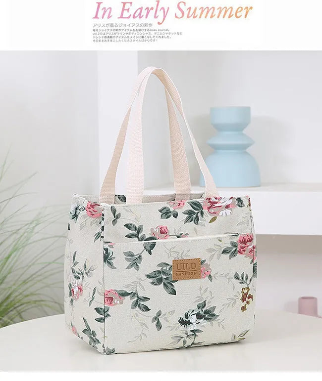 Women's printed canvas handbag with aluminium frame in horizontal square shape