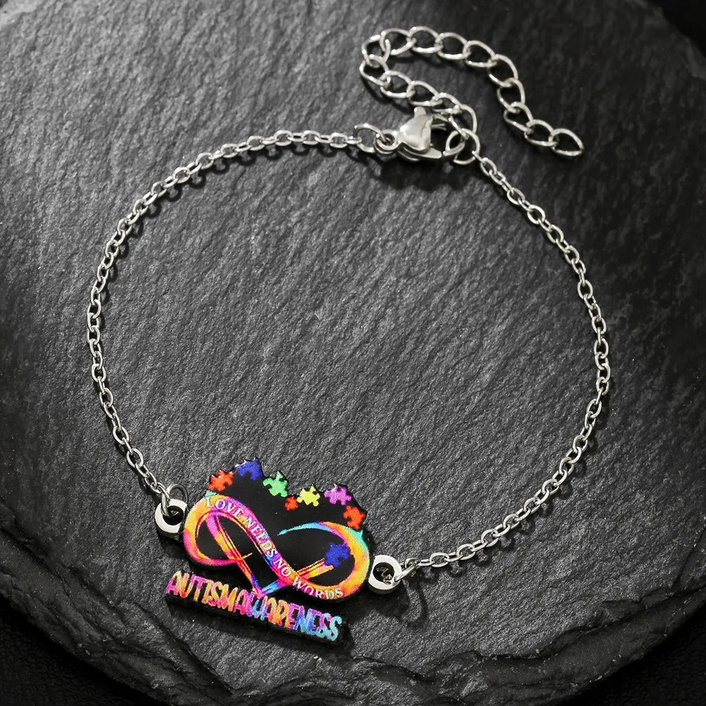 Stainless steel necklace and bracelet set with coloured inspirational printing on the pendants.