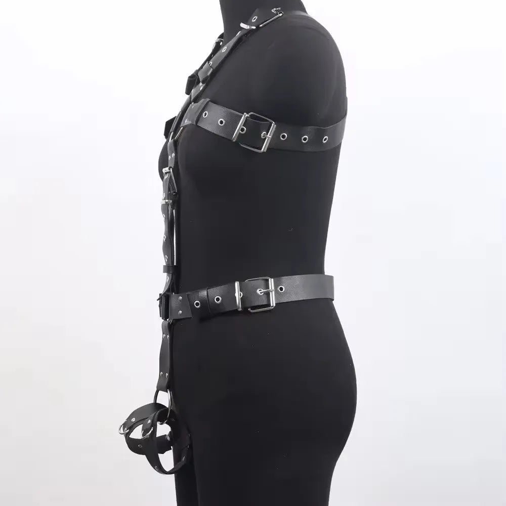 Thin black imitation leather waist belt with a patent finish and pin buckle closure.