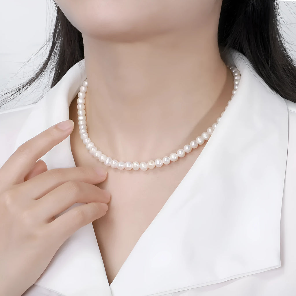 Adjustable sterling silver necklace with 6-7mm freshwater pearl pendant