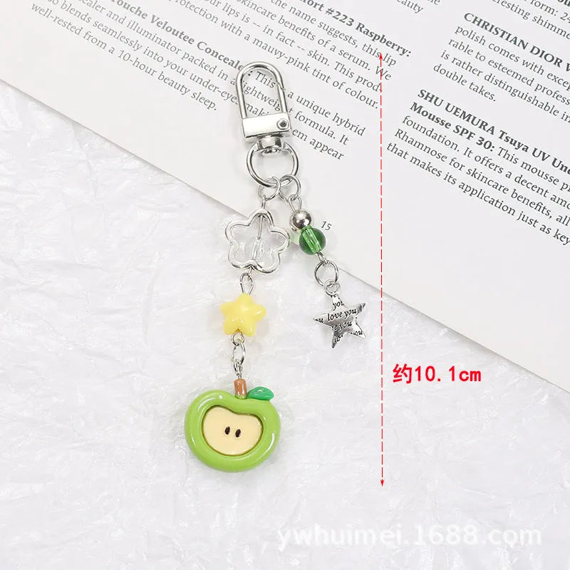 Plastic resin mobile phone keychain with fruit pattern including apple and strawberry designs