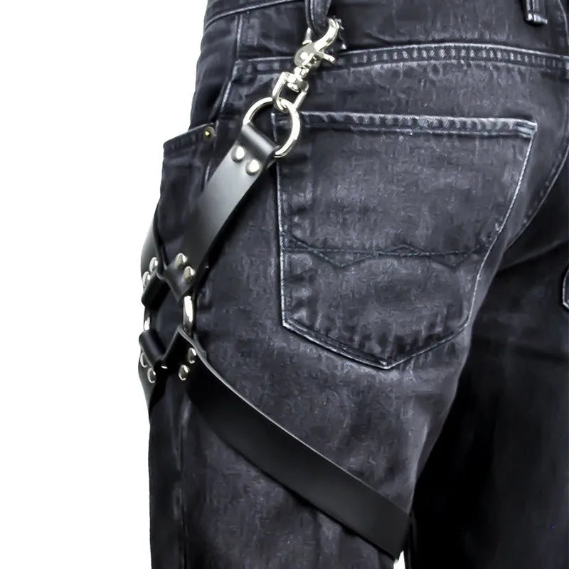 Women's black PU leather leggings laid flat, showing smooth material texture.