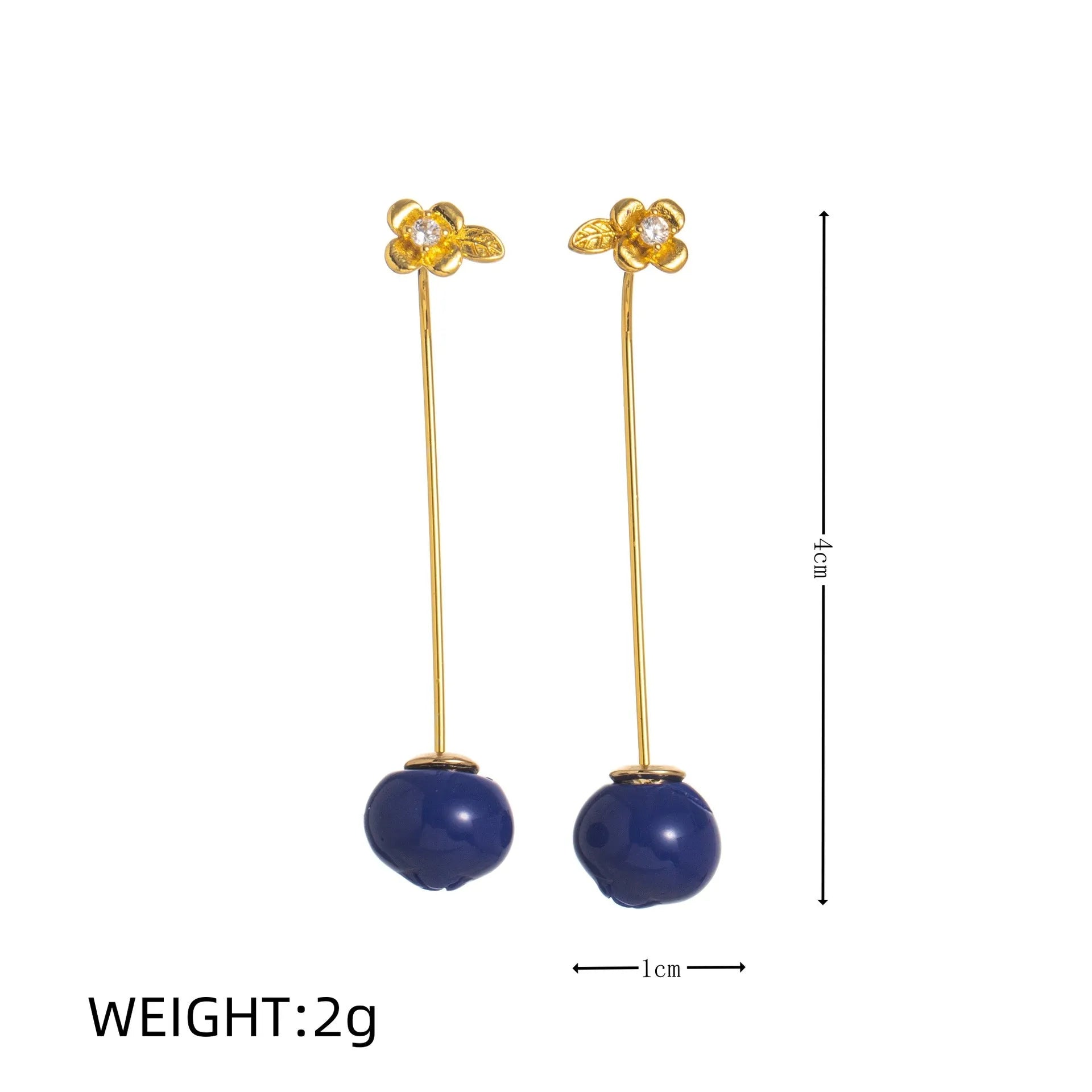 Gold plated fruit and vegetable design earrings showing carrot, orange and blueberry styles